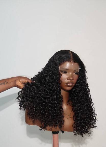 Elan 18-inch Burmese curly HD lace wig by Adelé Atelier