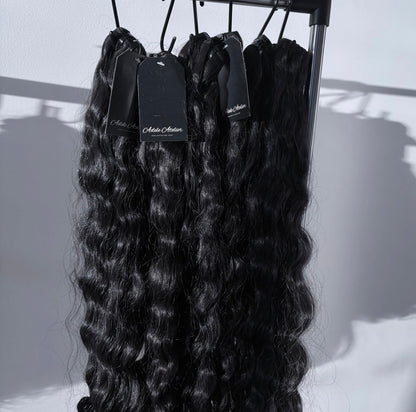 Raw Burmese hair bundles by Adelé Atelier